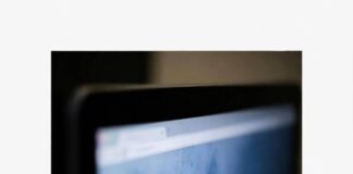 Best Gaming Consoles for 2025: Our Expert Recommendations Off-kilter shot of hazy screen glow in dim room, post-midnight vibe.