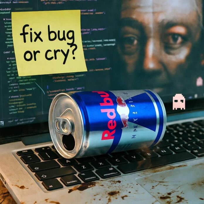 Red Bull can on stained laptop with "fix bug or cry?" note and pixel ghost.