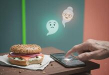 Tech Tips for Seniors: Simplifying Technology for Older Adults Old hand fumbles phone, bagel, and tangled cables.